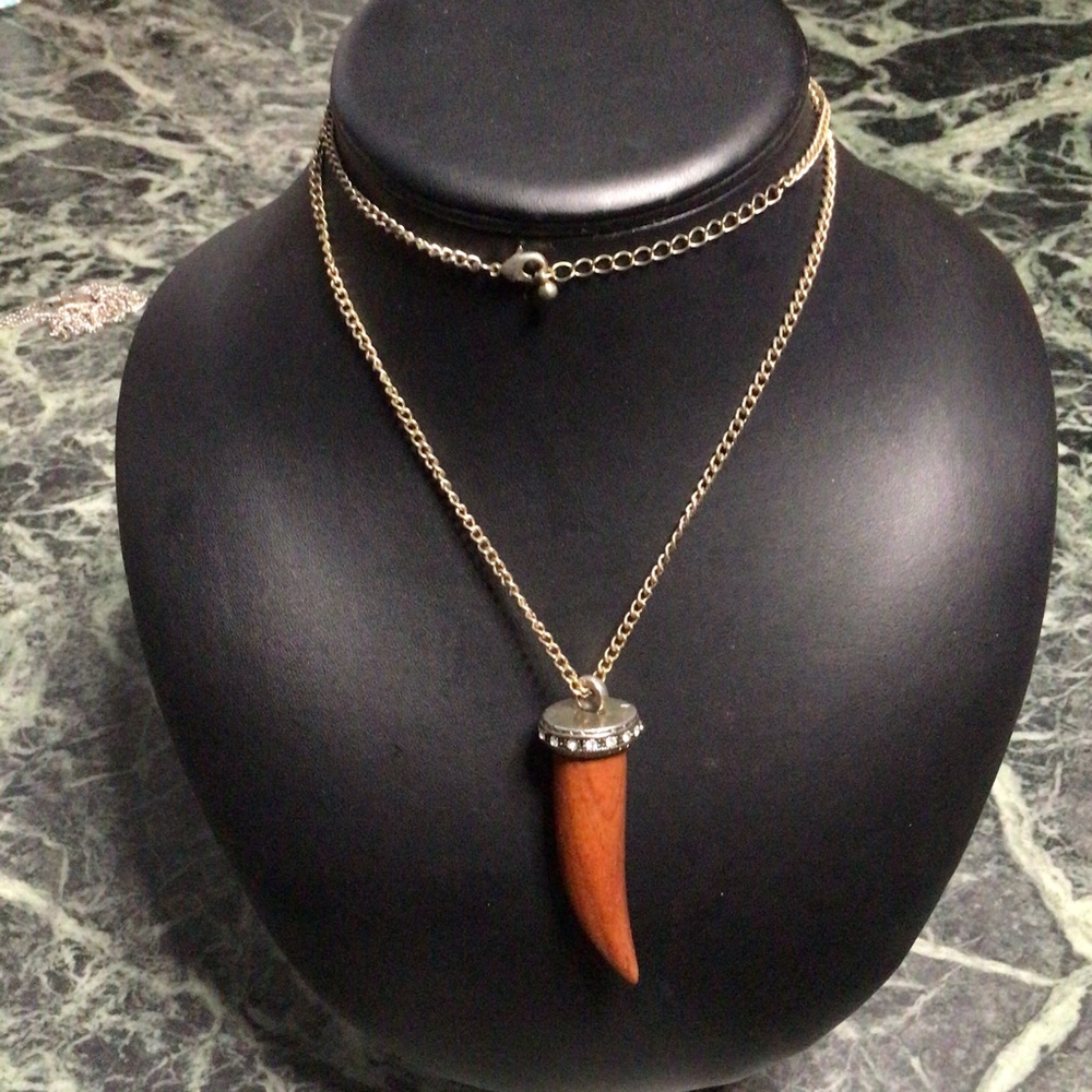 Adjustable Wood horn necklace.